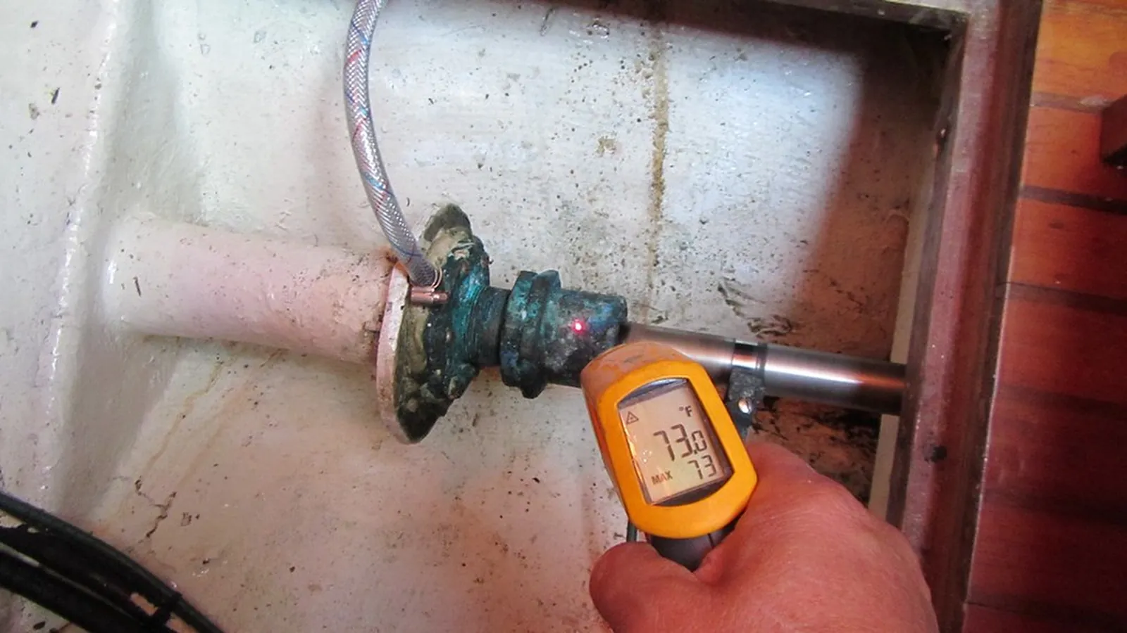 Infrared thermometer checking a valve and packing assembly