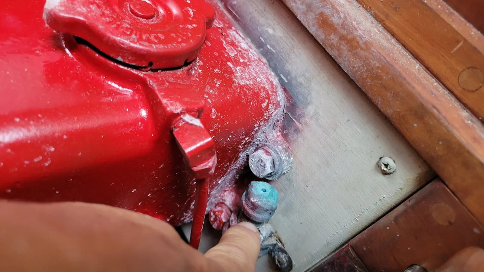 Close-up of a pump seal chamber being inspected for leakage paths
