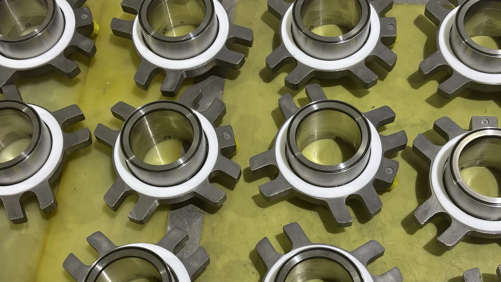 Grooved impeller and seal seat components on a workbench