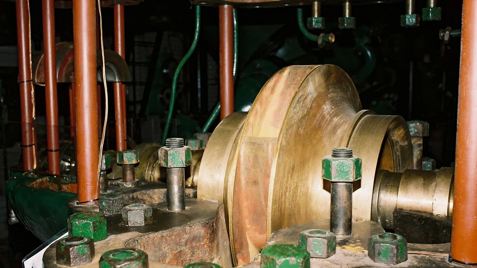 Bronze pump casing with studs close up in a pump station